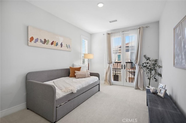 152 Plum Lily, Irvine, CA 92618 - carpeted living area featuring french doors and baseboards