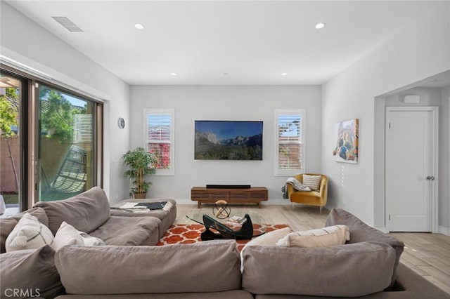 152 Plum Lily, Irvine, CA 92618 - living room with light wood-type flooring and recessed lighting