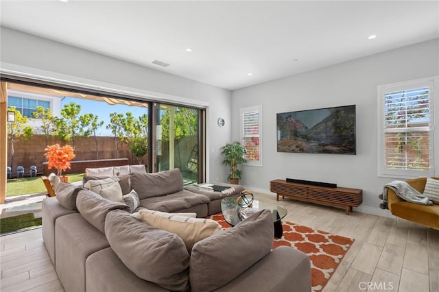152 Plum Lily, Irvine, CA 92618 - living room with light wood-style flooring and recessed lighting