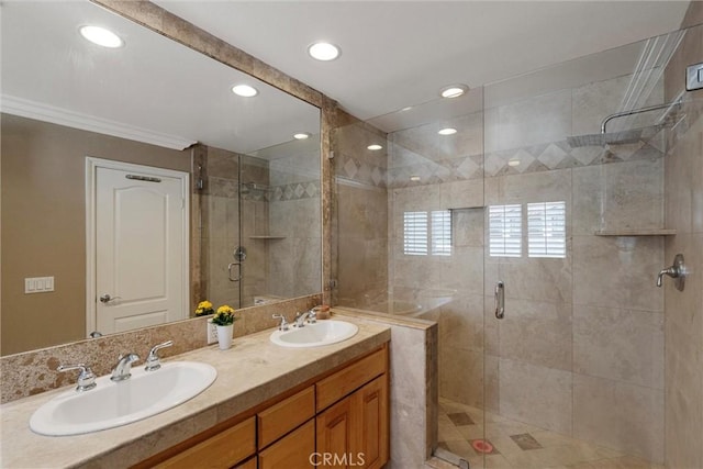 2613 Carnegie Ln # B, Redondo Beach, CA 90278 - bathroom featuring double vanity, crown molding, a stall shower, and recessed lighting
