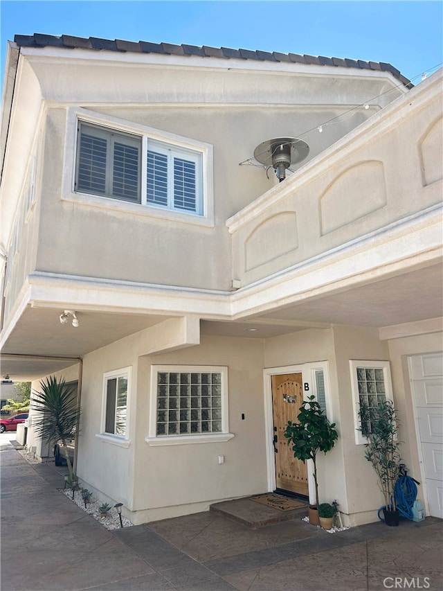 2613 Carnegie Ln # B, Redondo Beach, CA 90278 - doorway to property featuring stucco siding
