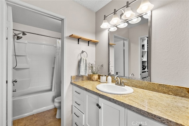17910 River Cir Unit 1, Canyon Country, CA 91387 - bathroom with vanity, shower / bath combo with shower curtain, and a textured wall