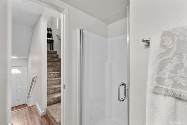 17910 River Cir Unit 1, Canyon Country, CA 91387 - full bath featuring wood finished floors and a shower stall