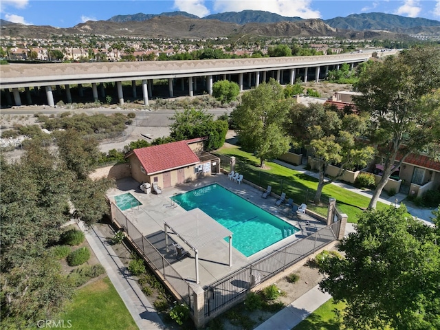 17910 River Cir Unit 1, Canyon Country, CA 91387 - community pool featuring a mountain view and a patio
