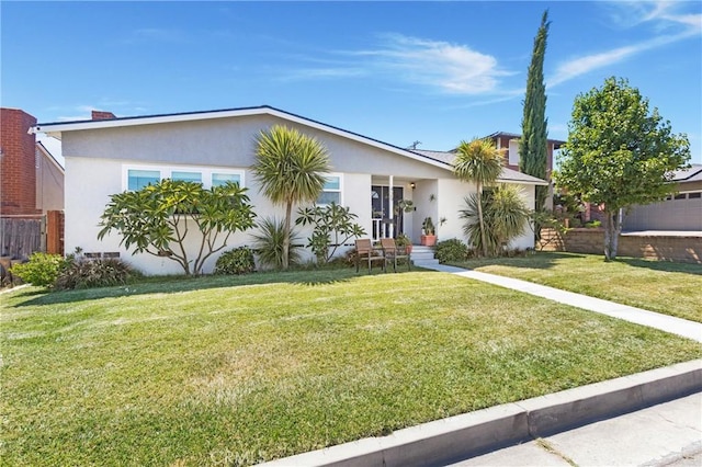 429 S Colfax St, La Habra, CA 90631 - view of front facade with a front lawn and stucco siding
