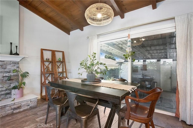 429 S Colfax St, La Habra, CA 90631 - dining space with wood ceiling, wood finished floors, and a stone fireplace