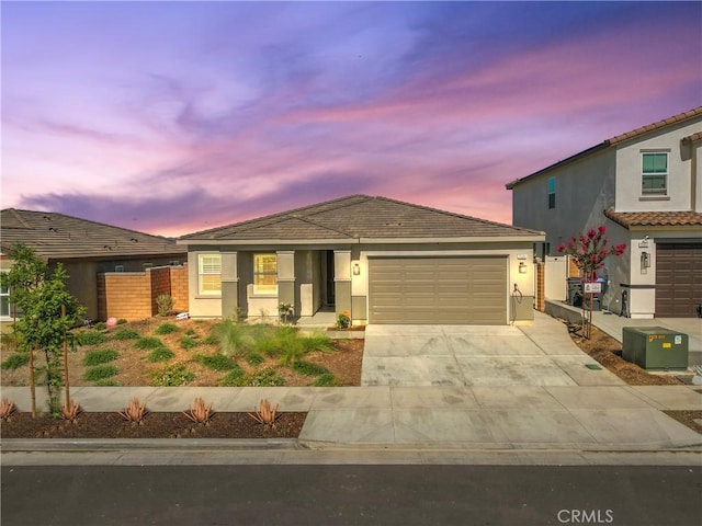 25541 Buckeye Meadow Ln, Homeland, CA 92548 - ranch-style house with driveway, a garage, and stucco siding