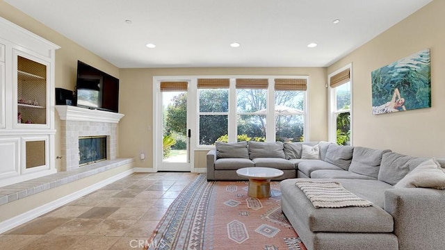 10 Calle Castillo, San Clemente, CA 92673 - living room featuring a brick fireplace and recessed lighting