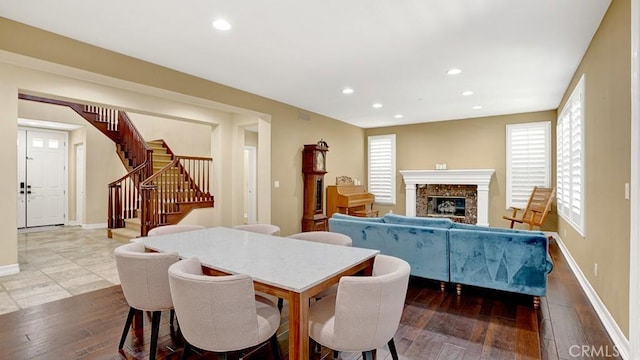 10 Calle Castillo, San Clemente, CA 92673 - dining space with wood-type flooring, stairway, recessed lighting, and a high end fireplace