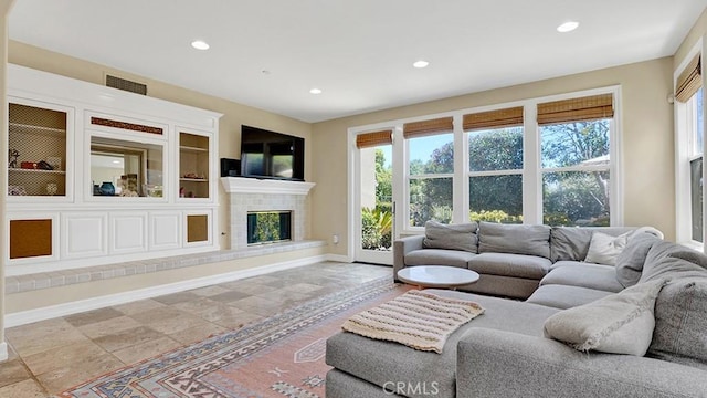 10 Calle Castillo, San Clemente, CA 92673 - living area featuring recessed lighting, a tile fireplace, and stone tile flooring