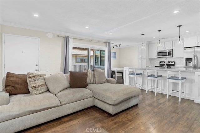 17700 Palo Verde Ave, Cerritos, CA 90703 - living area featuring recessed lighting, crown molding, and dark wood finished floors