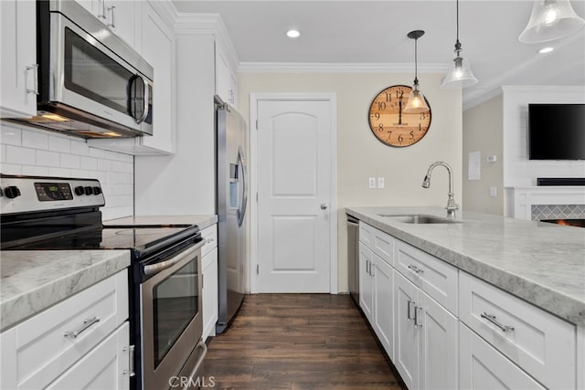 17700 Palo Verde Ave, Cerritos, CA 90703 - kitchen with stainless steel appliances, crown molding, decorative backsplash, recessed lighting, and white cabinets
