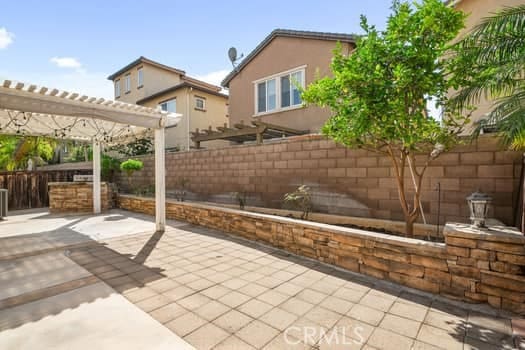 252 W Tulip Tree Ave, Orange, CA 92865 - fenced backyard featuring a patio