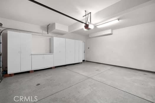 252 W Tulip Tree Ave, Orange, CA 92865 - garage with a garage door opener