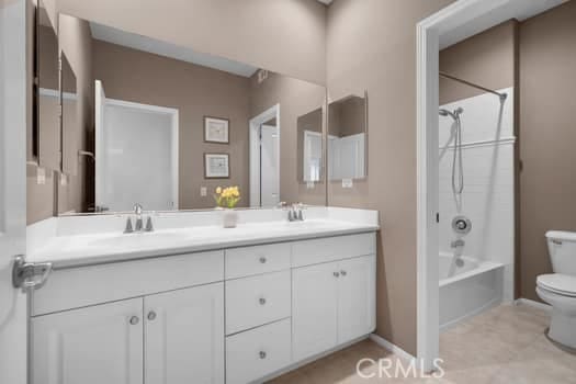 252 W Tulip Tree Ave, Orange, CA 92865 - bathroom featuring double vanity and bathtub / shower combination