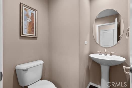 252 W Tulip Tree Ave, Orange, CA 92865 - bathroom featuring toilet and a sink