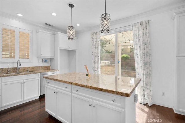 252 W Tulip Tree Ave, Orange, CA 92865 - kitchen with dishwasher, dark wood-style floors, white cabinetry, light stone countertops, and ornamental molding