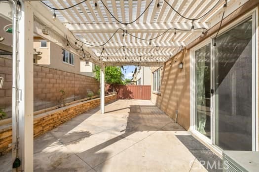 252 W Tulip Tree Ave, Orange, CA 92865 - fenced backyard featuring a patio and a pergola
