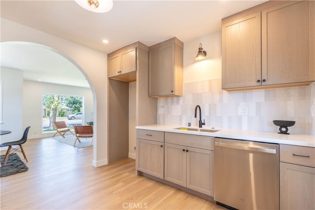 10536 La Mirada Blvd, Whittier, CA 90604 - kitchen featuring dishwasher, arched walkways, light wood finished floors, decorative backsplash, and recessed lighting