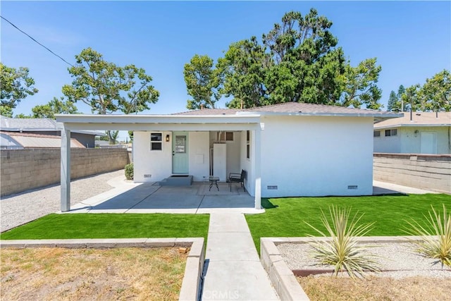 10536 La Mirada Blvd, Whittier, CA 90604 - view of front of house featuring stucco siding, crawl space, a fenced backyard, and a patio