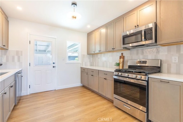 10536 La Mirada Blvd, Whittier, CA 90604 - kitchen featuring stainless steel appliances, light wood-style flooring, light countertops, and recessed lighting