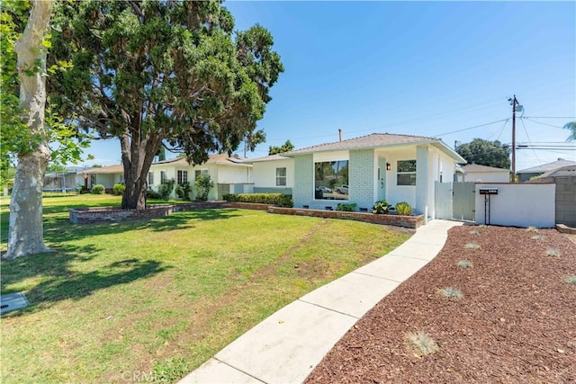 10536 La Mirada Blvd, Whittier, CA 90604 - ranch-style home featuring a gate and brick siding