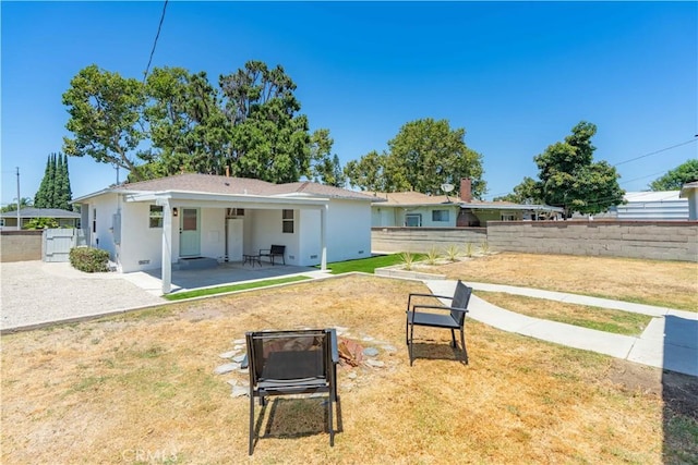 10536 La Mirada Blvd, Whittier, CA 90604 - back of house featuring a patio area, stucco siding, and a fire pit
