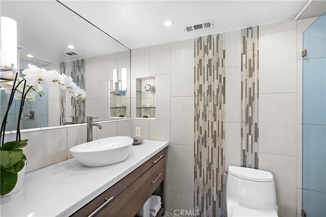 33942 Pequito Dr, Dana Point, CA 92629 - bathroom with tile walls, vanity, and recessed lighting