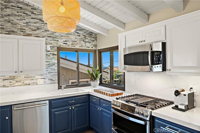 33942 Pequito Dr, Dana Point, CA 92629 - kitchen featuring appliances with stainless steel finishes, blue cabinetry, tasteful backsplash, white cabinetry, and beam ceiling