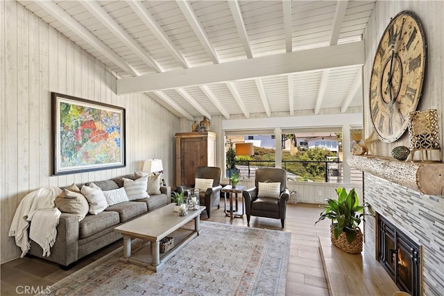 33942 Pequito Dr, Dana Point, CA 92629 - living area with hardwood / wood-style floors, wooden walls, and a fireplace