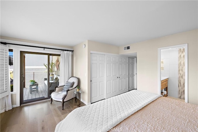 33942 Pequito Dr, Dana Point, CA 92629 - bedroom with wood finished floors, a closet, access to exterior, and ensuite bath