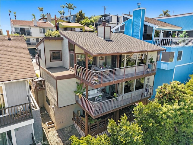 33942 Pequito Dr, Dana Point, CA 92629 - back of property with a chimney, a residential view, and a shingled roof