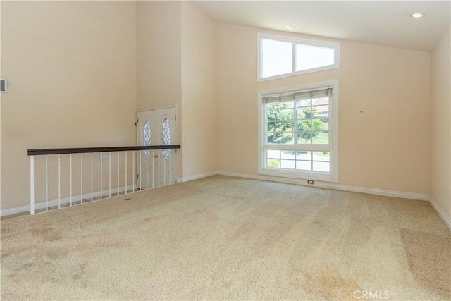 27021 Moro Azul, Mission Viejo, CA 92691 - carpeted spare room with high vaulted ceiling and healthy amount of natural light