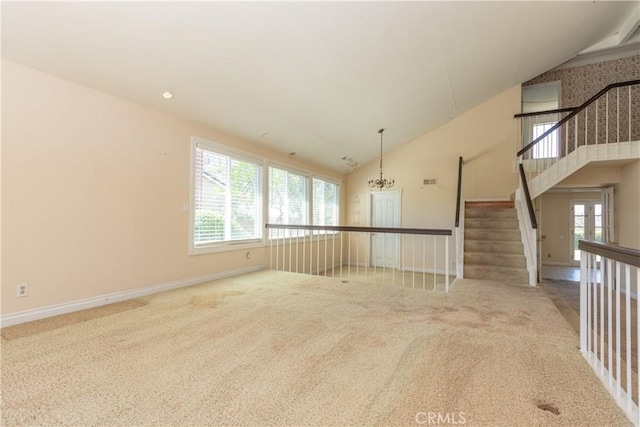 27021 Moro Azul, Mission Viejo, CA 92691 - unfurnished room with plenty of natural light, carpet floors, high vaulted ceiling, and stairway
