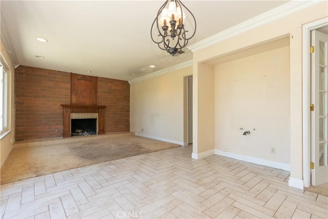 27021 Moro Azul, Mission Viejo, CA 92691 - unfurnished living room featuring a chandelier, a large fireplace, crown molding, and recessed lighting