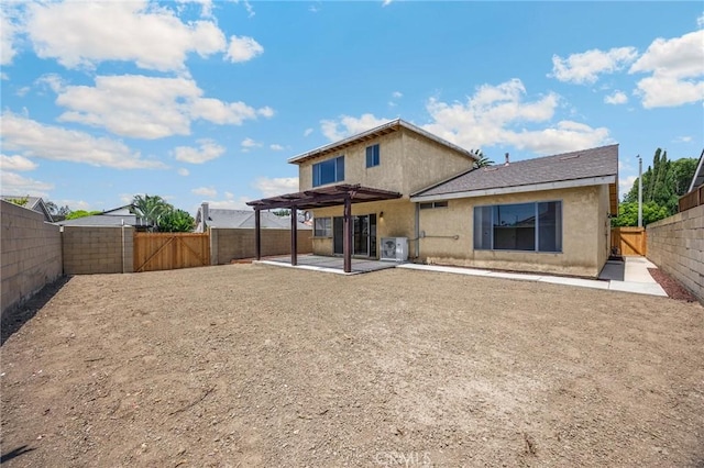 4510 E Hightree Cir, Anaheim, CA 92807 - back of property with a patio, stucco siding, a fenced backyard, and a gate