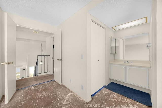 4510 E Hightree Cir, Anaheim, CA 92807 - corridor with a textured ceiling