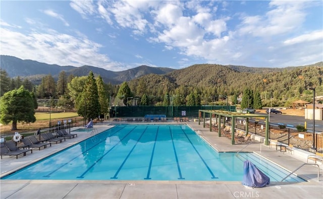 2229 Birchwood Way, Pine Mountain Club, CA 93222 - community pool featuring a mountain view, a patio area, and a wooded view