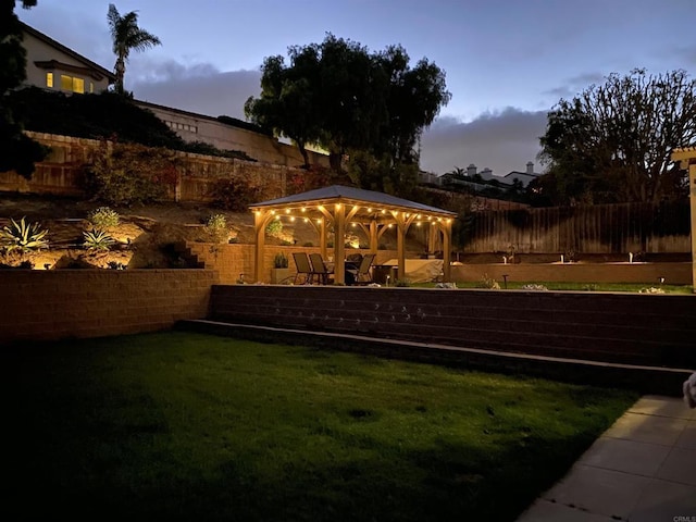 1851 Valencia Ave, Carlsbad, CA 92008 - yard at dusk featuring a gazebo and a fenced backyard