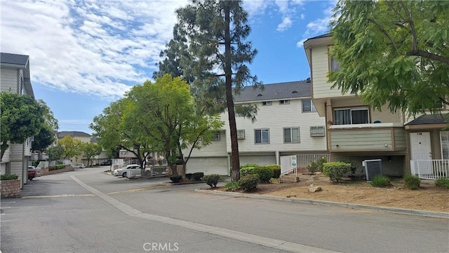 11150 Glenoaks Blvd Unit 106, Pacoima, CA 91331 - view of asphalt road with curbs and a residential view