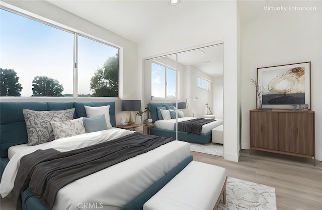 11150 Glenoaks Blvd Unit 106, Pacoima, CA 91331 - bedroom featuring light wood finished floors and a closet
