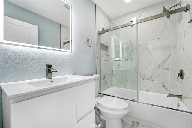 11150 Glenoaks Blvd Unit 106, Pacoima, CA 91331 - full bath featuring vanity, shower / bath combination with glass door, a textured wall, and marble look tiles