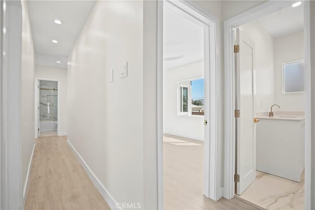 1230 Spazier Ave, Glendale, CA 91201 - hallway featuring light wood-type flooring and recessed lighting