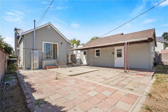1230 Spazier Ave, Glendale, CA 91201 - back of property featuring stucco siding and a patio area
