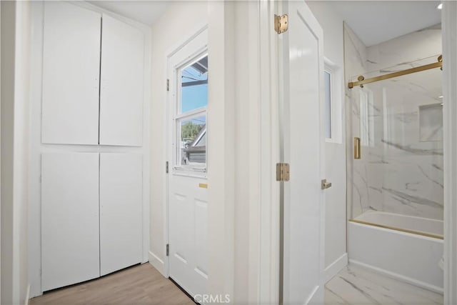 1230 Spazier Ave, Glendale, CA 91201 - bathroom featuring combined bath / shower with glass door and baseboards