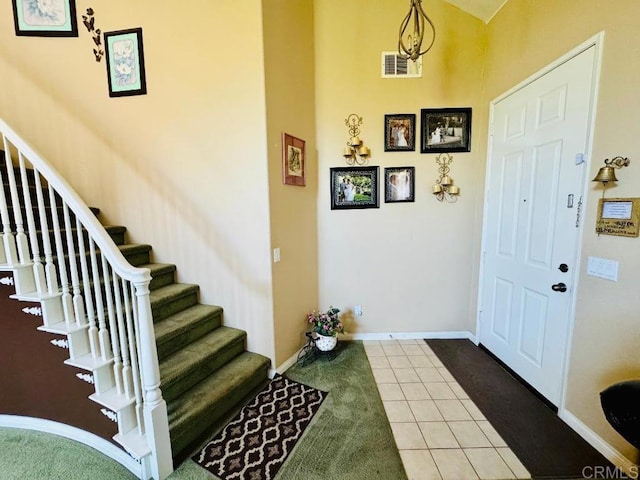 1670 Hillsborough St, Chula Vista, CA 91913 - foyer with tile patterned floors and stairs