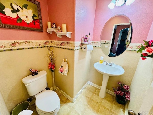 1670 Hillsborough St, Chula Vista, CA 91913 - half bathroom with toilet and tile patterned floors