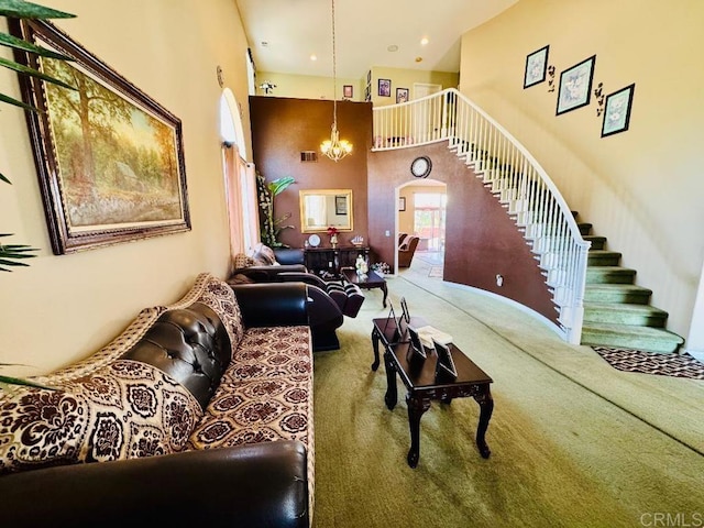 1670 Hillsborough St, Chula Vista, CA 91913 - carpeted living room with arched walkways, stairs, a high ceiling, and a chandelier