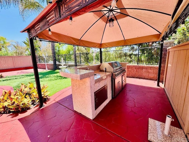 1670 Hillsborough St, Chula Vista, CA 91913 - fenced backyard featuring exterior kitchen, a gazebo, and a patio area