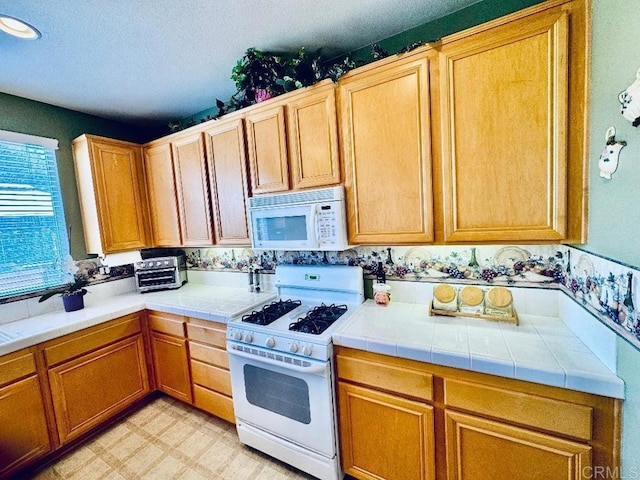 1670 Hillsborough St, Chula Vista, CA 91913 - kitchen featuring white appliances and a textured ceiling